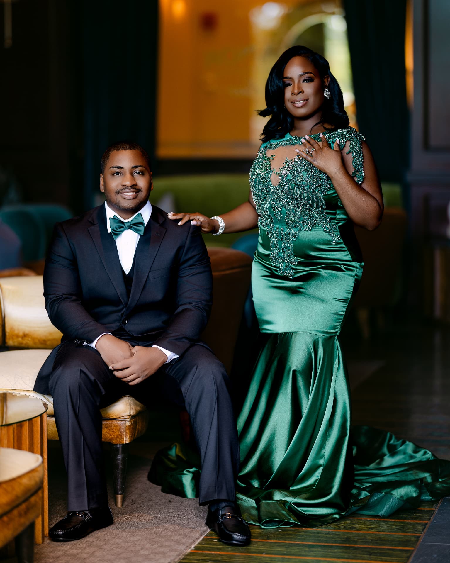 Editorial portrait of the couple in a vintage lounge